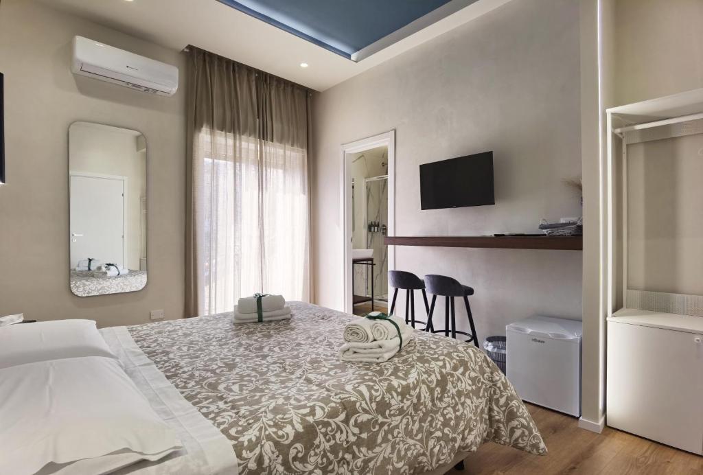 Postel nebo postele na pokoji v ubytování Tersikore bedrooms