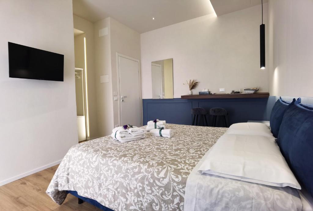 Postel nebo postele na pokoji v ubytování Tersikore bedrooms