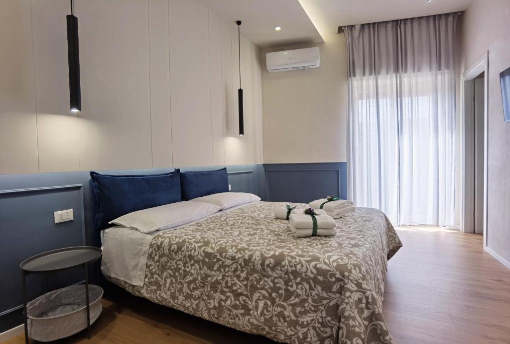 Postel nebo postele na pokoji v ubytování Tersikore bedrooms