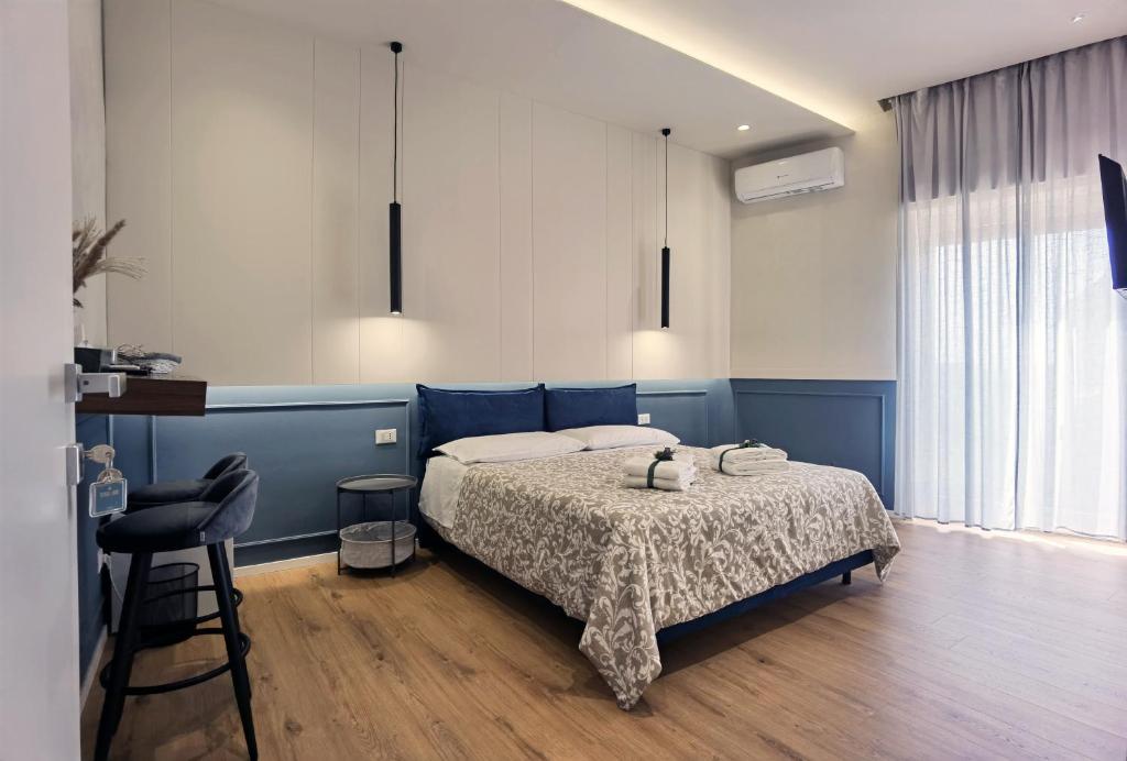 Postel nebo postele na pokoji v ubytování Tersikore bedrooms