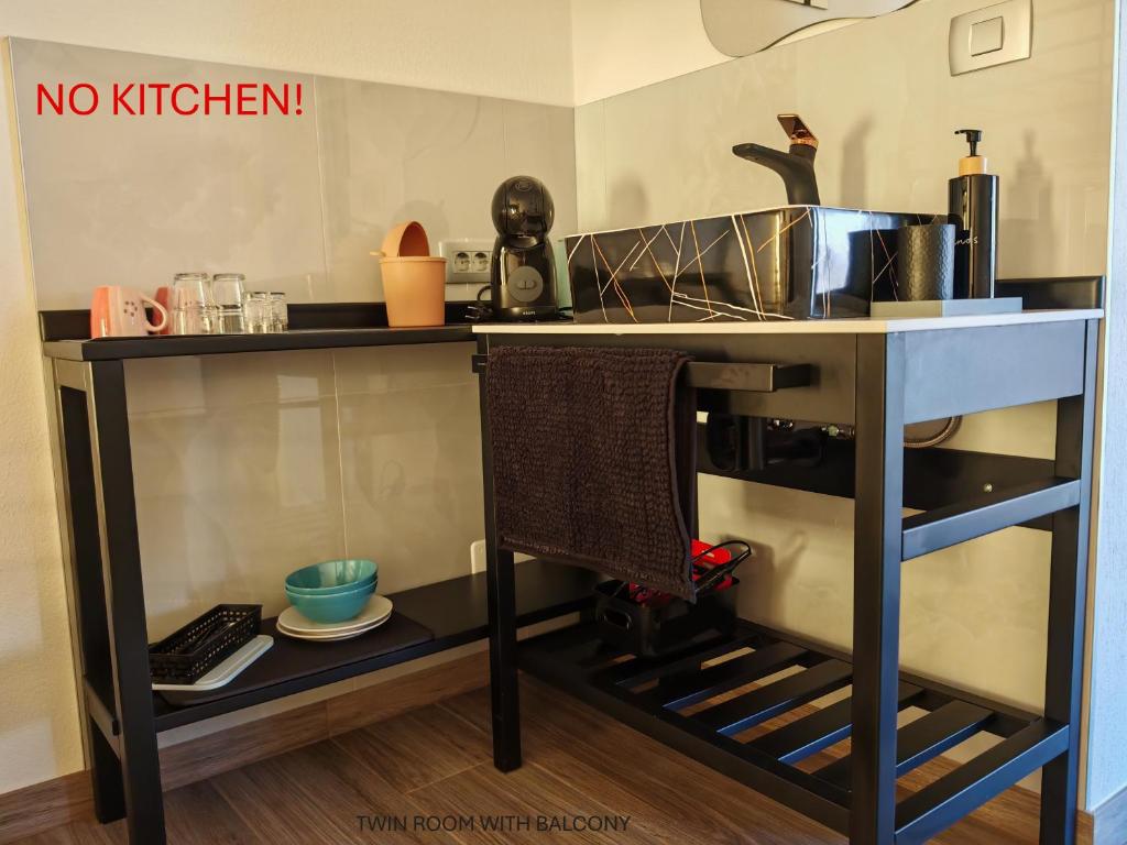 Kuchyň nebo kuchyňský kout v ubytování Apartment and room Anica