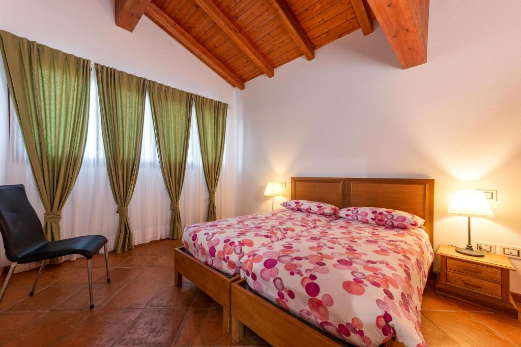 Postel nebo postele na pokoji v ubytování Massa Vecchia