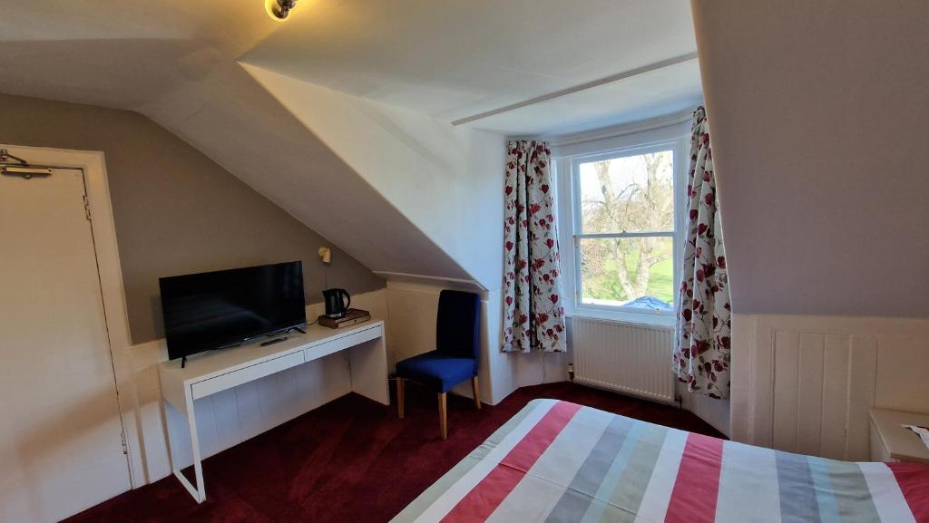 TV a/nebo společenská místnost v ubytování Mackenzie Guest house