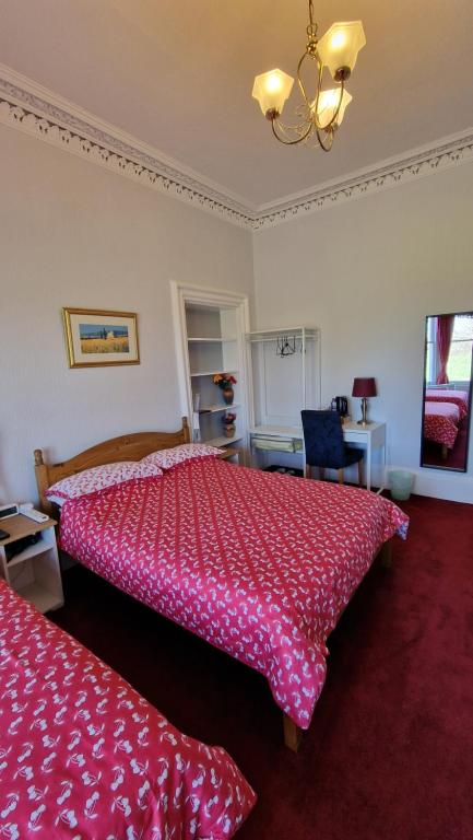 Postel nebo postele na pokoji v ubytování Mackenzie Guest house