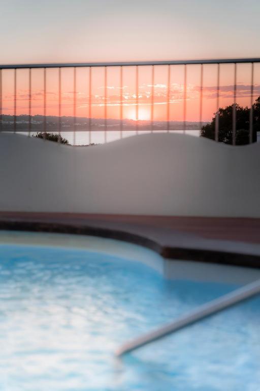 Bazén v ubytování Hotel Sa Volta nebo v jeho okolí