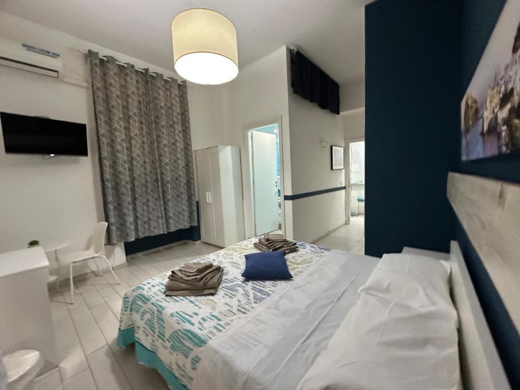 Postel nebo postele na pokoji v ubytování B&B Phistelia