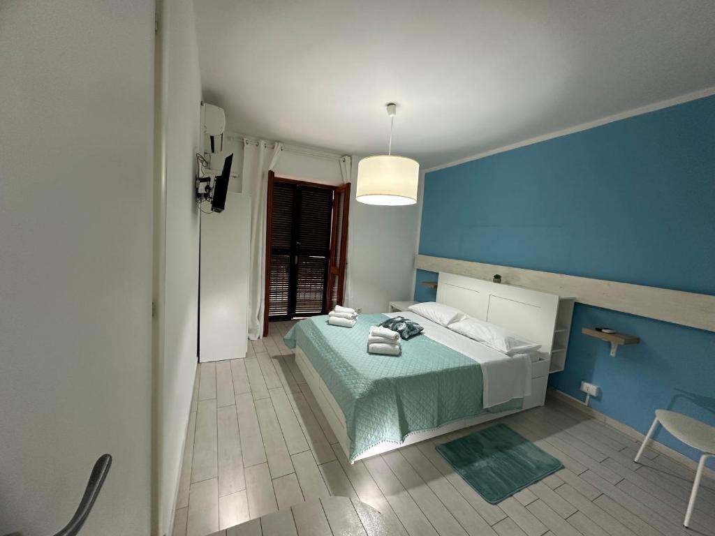 Postel nebo postele na pokoji v ubytování B&B Phistelia