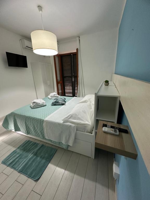 Postel nebo postele na pokoji v ubytování B&B Phistelia