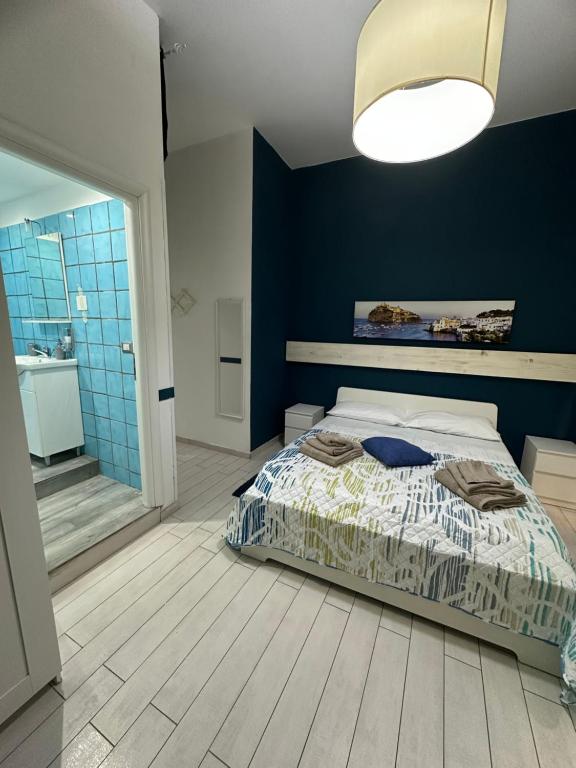 Postel nebo postele na pokoji v ubytování B&B Phistelia