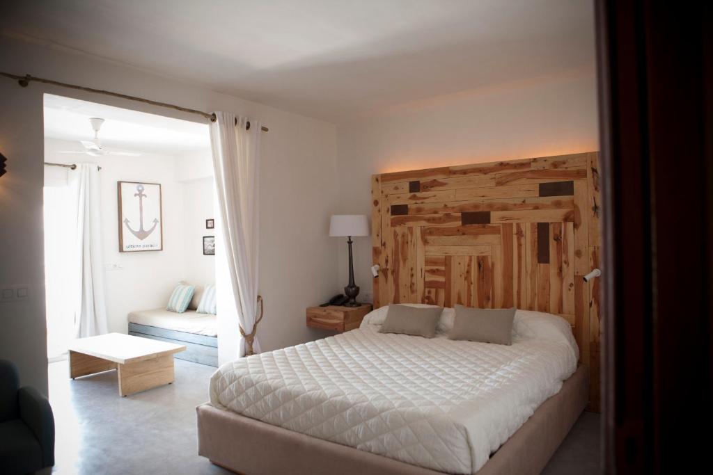 Postel nebo postele na pokoji v ubytování Hotel Sa Volta
