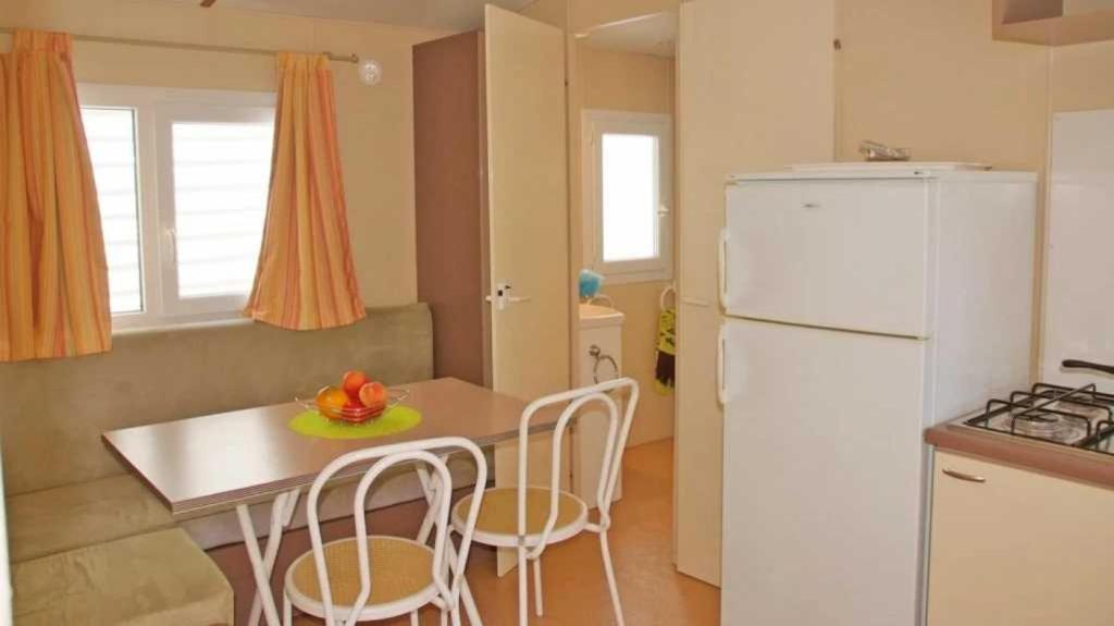 Kuchyň nebo kuchyňský kout v ubytování Camping 3 étoiles - ccbaf0c