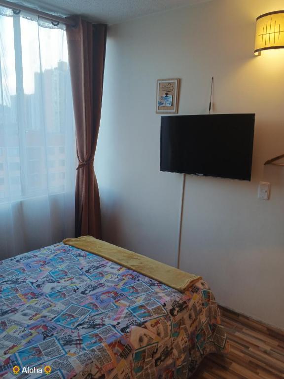 Postel nebo postele na pokoji v ubytování AlohaT Habitaciones