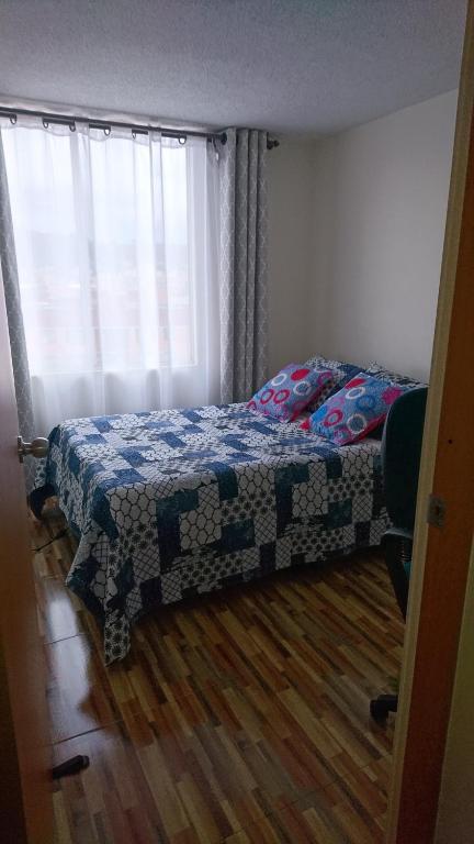 Postel nebo postele na pokoji v ubytování AlohaT Habitaciones