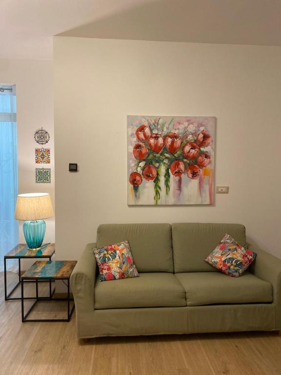 Posedenie v ubytovaní Pecciolo Port Apartaments