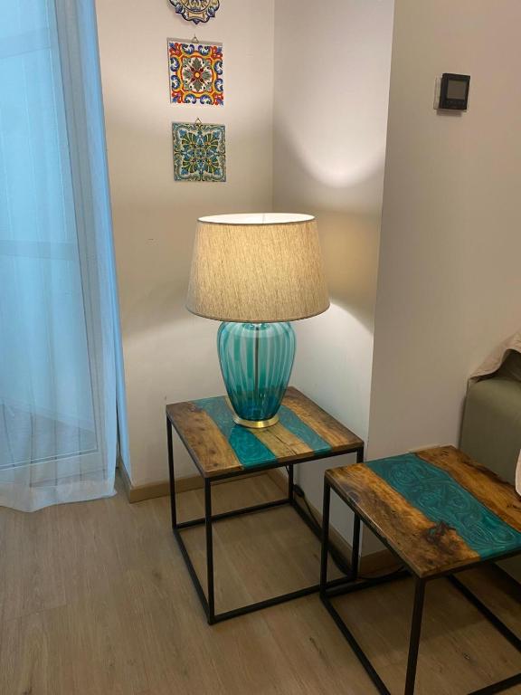 Posedenie v ubytovaní Pecciolo Port Apartaments