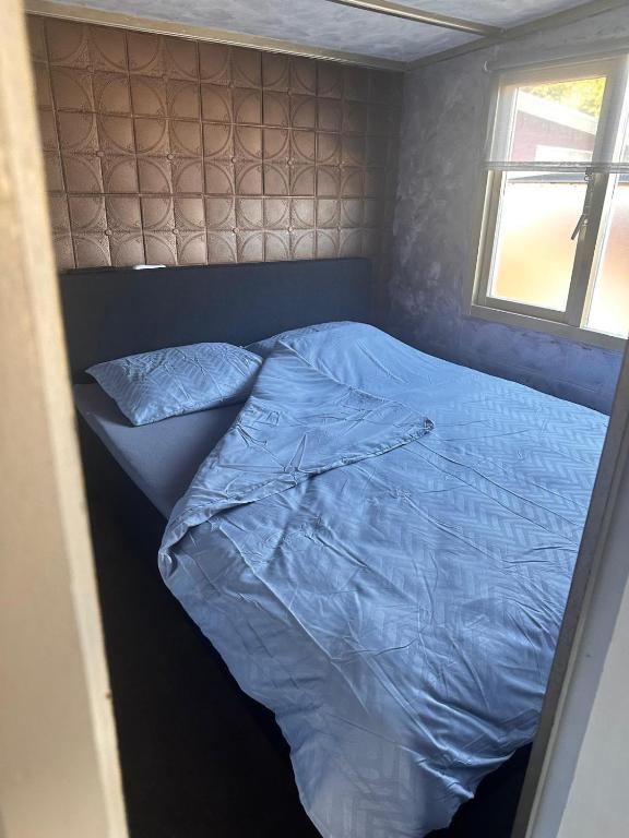 Postel nebo postele na pokoji v ubytování Chalet 151 Kniphorst Anloo