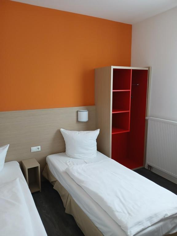 Postel nebo postele na pokoji v ubytování Hotel am Kieler Schloss by Première Classe