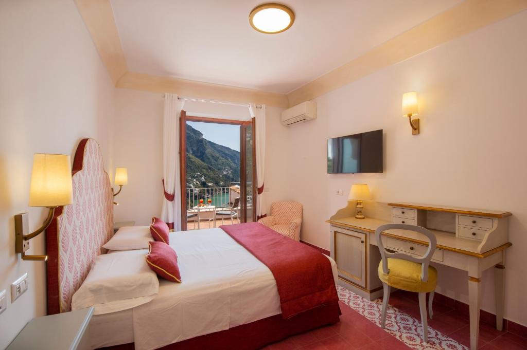 Postel nebo postele na pokoji v ubytování Hotel Casa Albertina