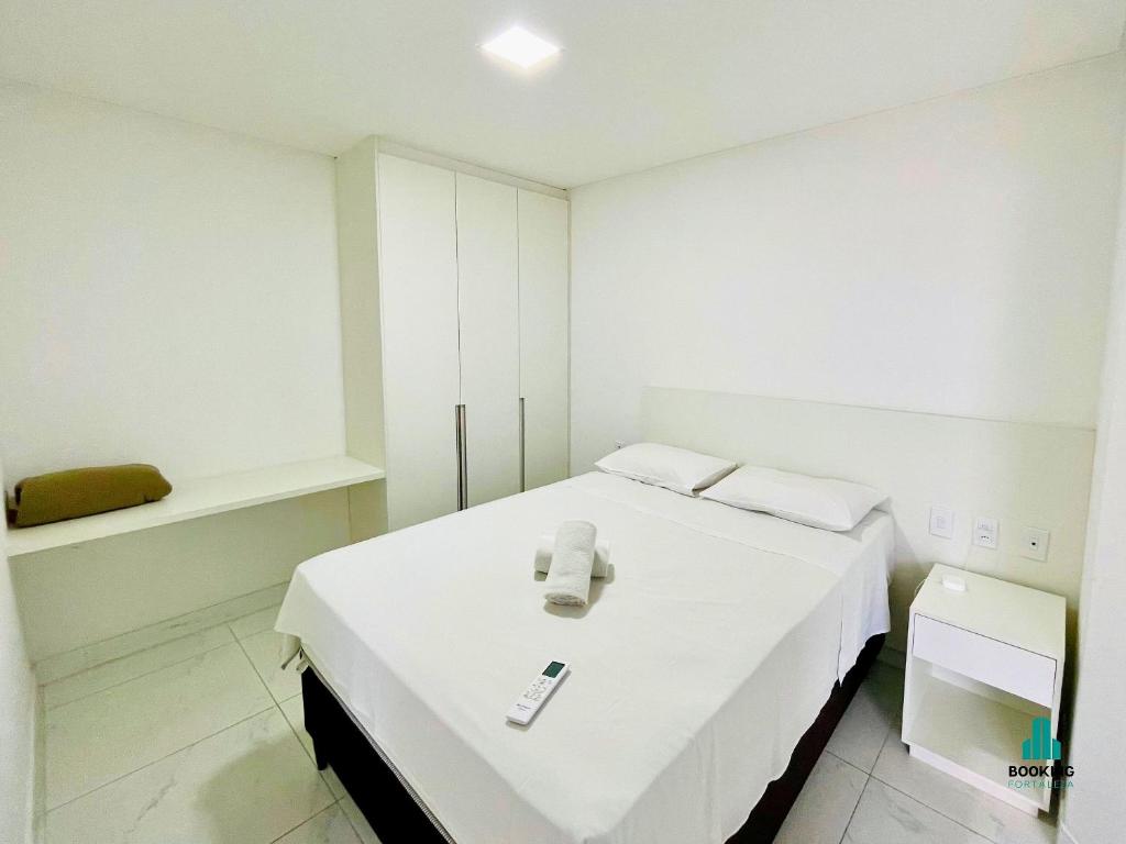 Postel nebo postele na pokoji v ubytování Aquarius Residence