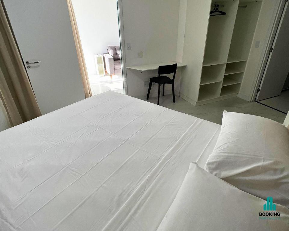 Postel nebo postele na pokoji v ubytování Aquarius Residence