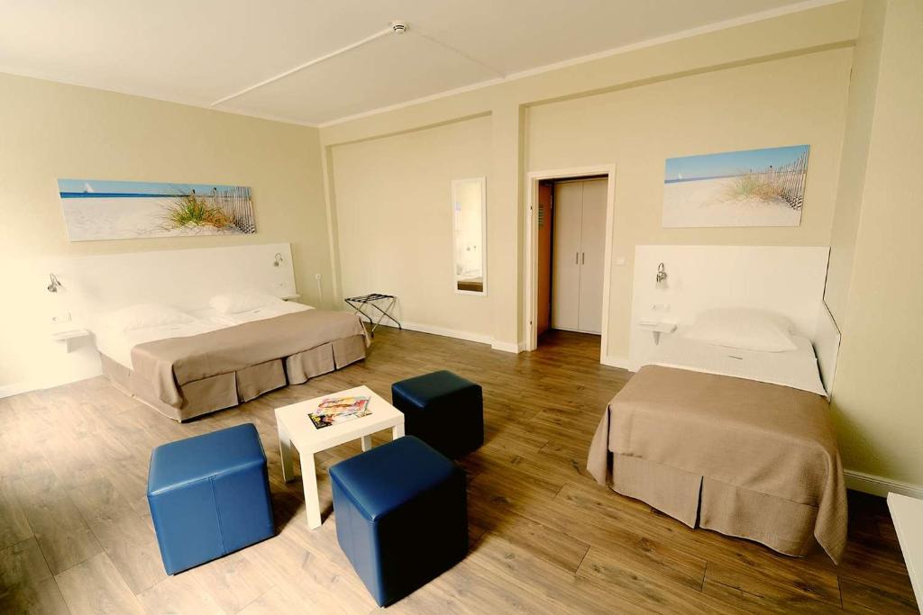 Postel nebo postele na pokoji v ubytování Hotel am Kieler Schloss by Première Classe