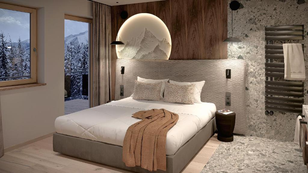 Letto o letti in una camera di Hotel Tirolerhof 4 Sterne Superior