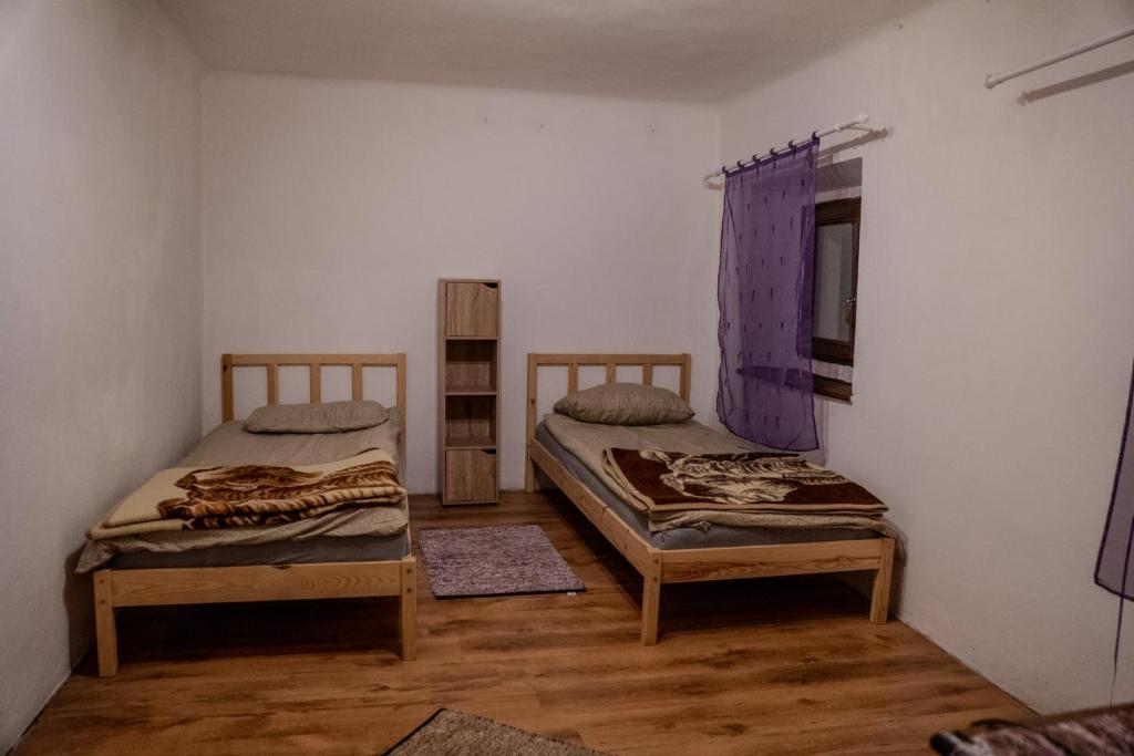 Ένα ή περισσότερα κρεβάτια σε δωμάτιο στο Sigma house