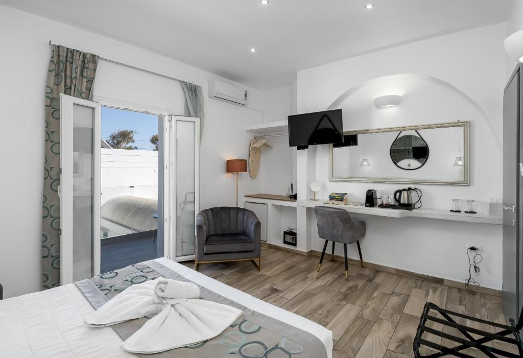 Kuchyň nebo kuchyňský kout v ubytování Oasis Suites Fira