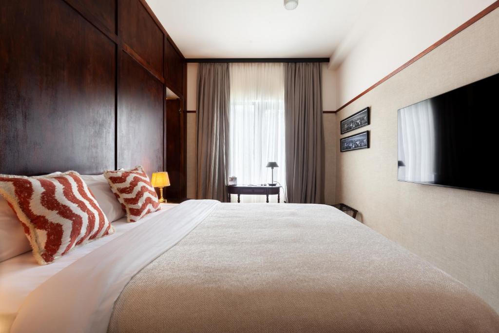 Postel nebo postele na pokoji v ubytování Communal Hotel Kutaisi