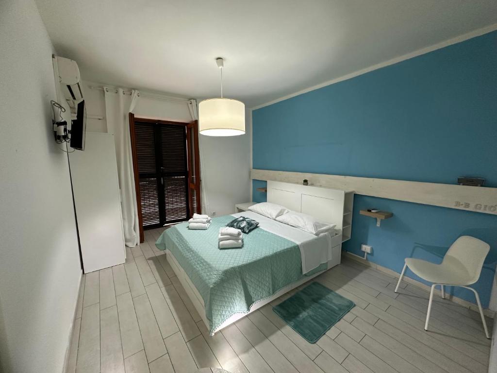 Postel nebo postele na pokoji v ubytování B&B Phistelia