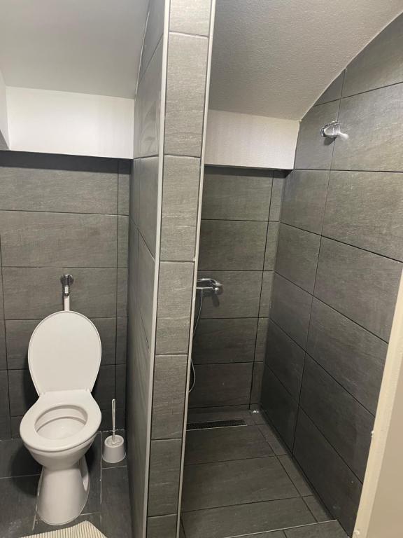 Koupelna v ubytování Centrum Apartman