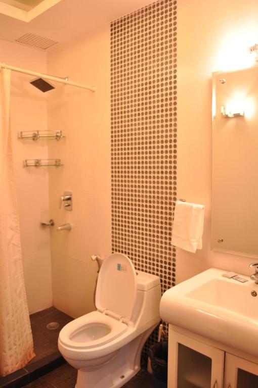 Koupelna v ubytování Solo Victoria Hotel