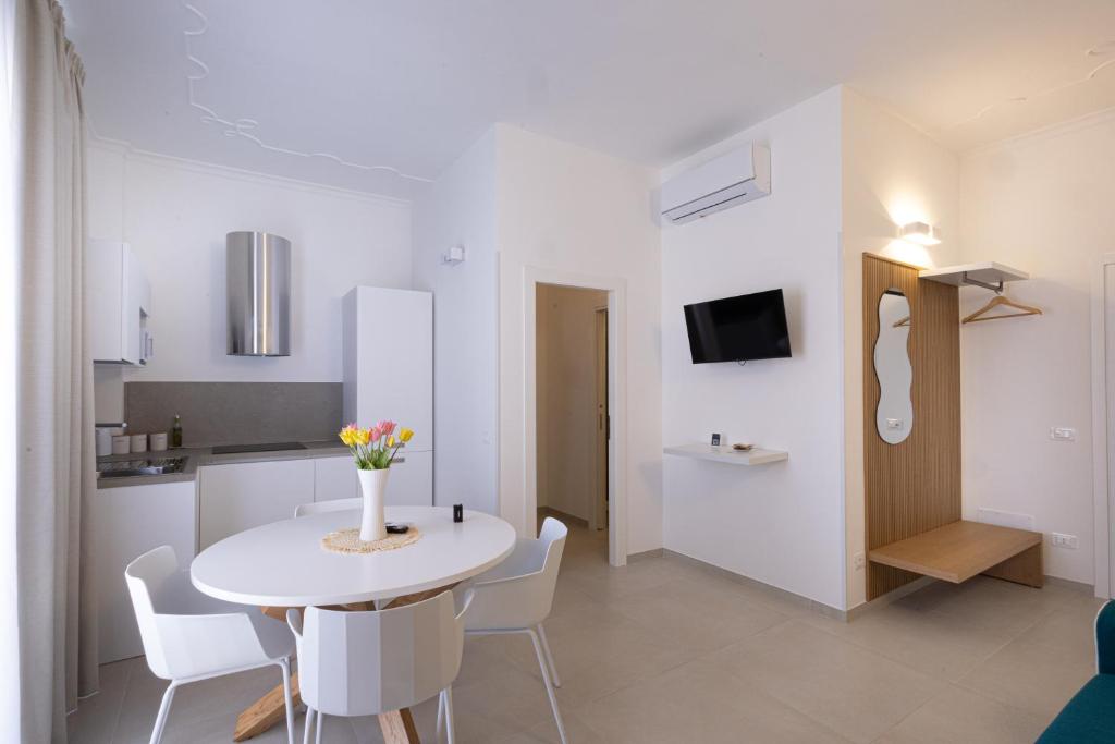 Kuchyň nebo kuchyňský kout v ubytování ADAMAS apartment , rooms and suite