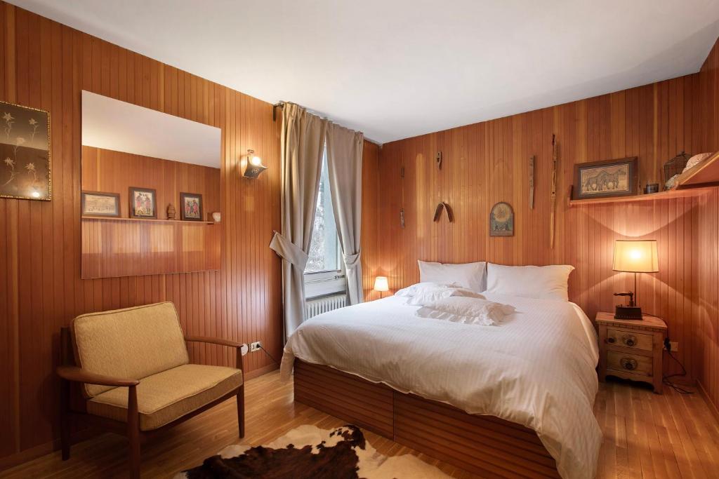 Ένα ή περισσότερα κρεβάτια σε δωμάτιο στο Maison Alessia Courmayeur