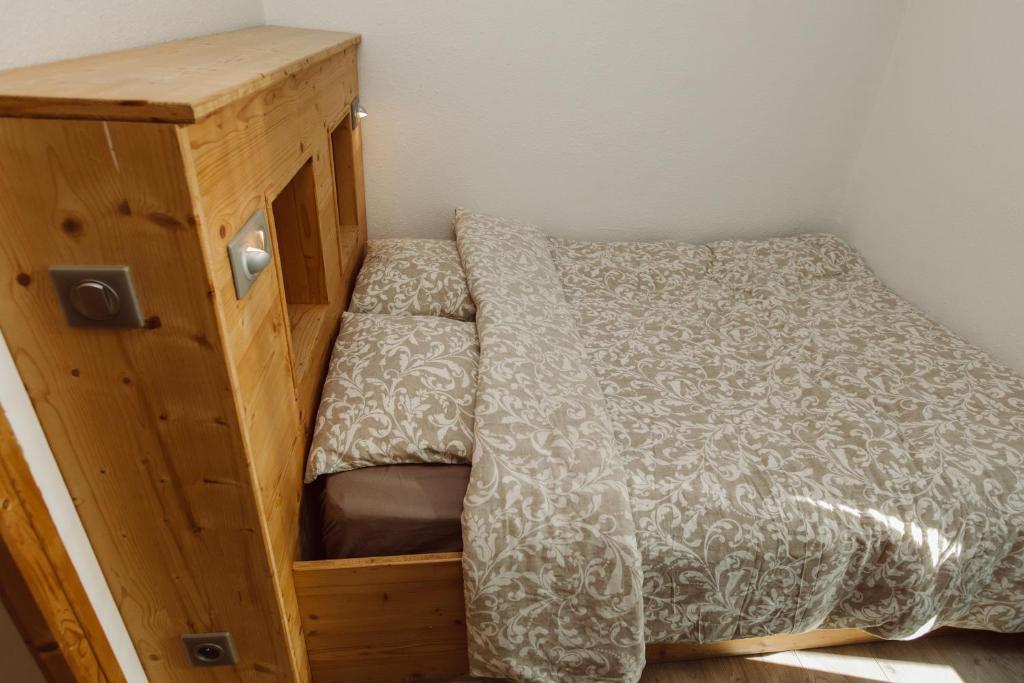 Postel nebo postele na pokoji v ubytování ETERPA Les chalets de Pré Clos en Vercors