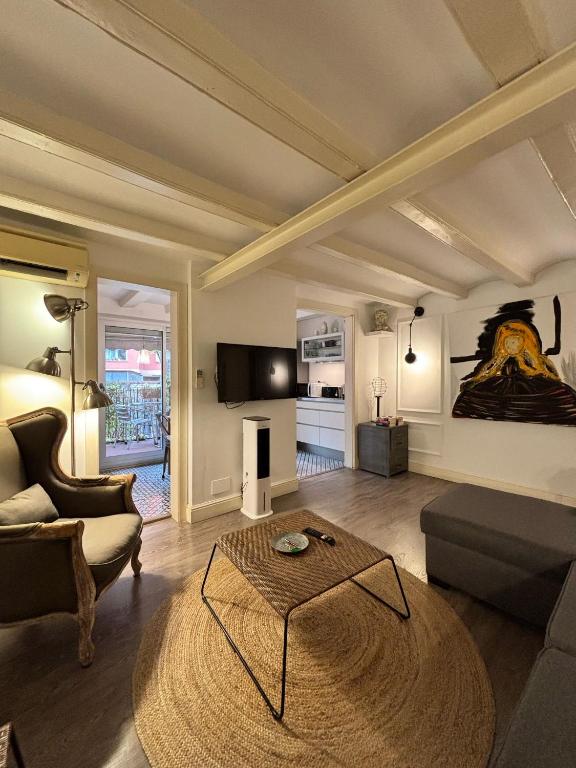 TV a/nebo společenská místnost v ubytování Rosselló Apartment