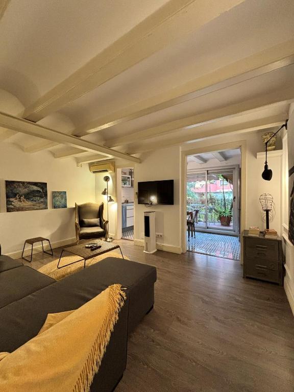 TV a/nebo společenská místnost v ubytování Rosselló Apartment