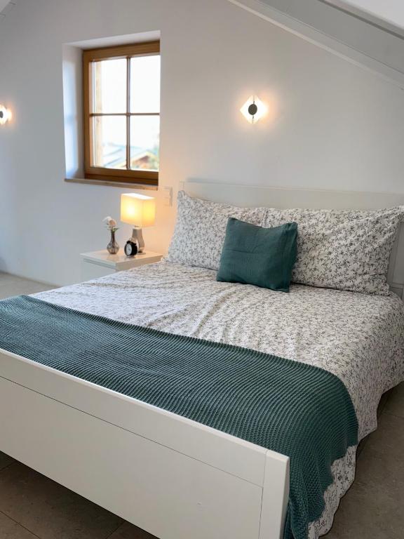 Postel nebo postele na pokoji v ubytování Ferienwohnung Siglreitmaier