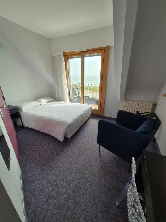 Postel nebo postele na pokoji v ubytování Hôtel l'Albatros