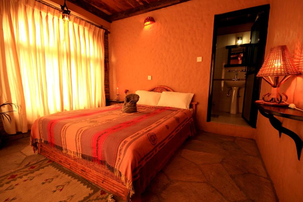 Letto o letti in una camera di Peace Eye Guest House