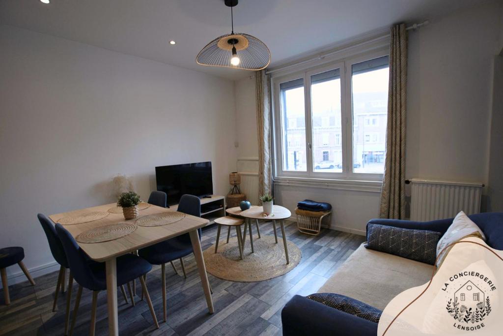 Et opholdsområde på La maison citadine, avec garage