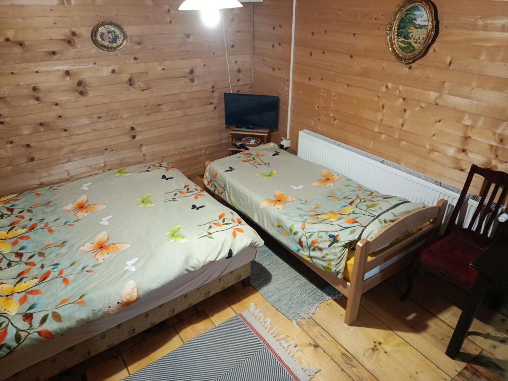 Postel nebo postele na pokoji v ubytování Domaćinstvo Radivojević