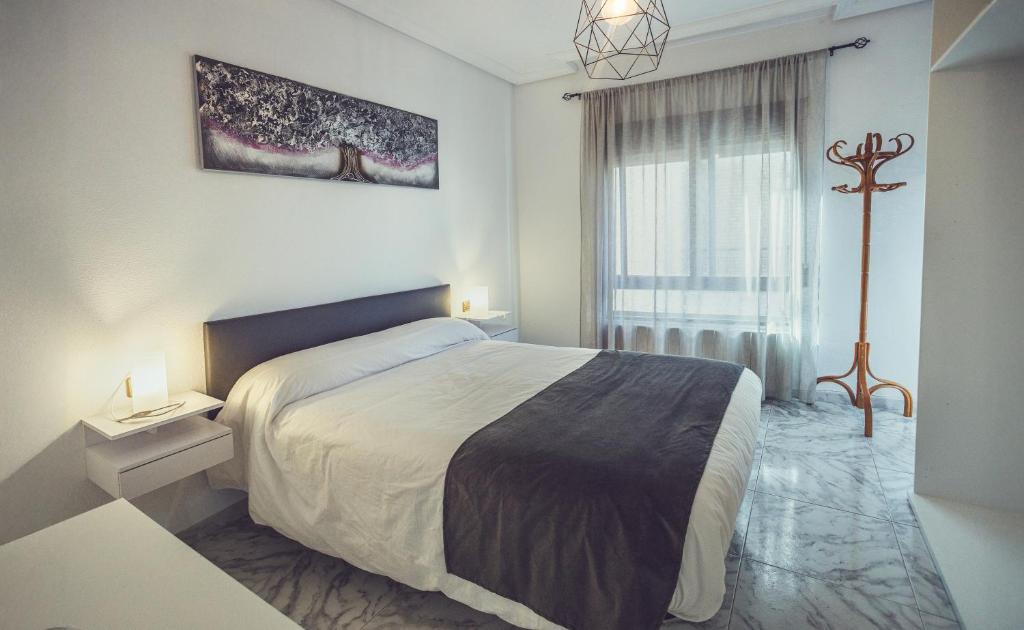 Posteľ alebo postele v izbe v ubytovaní Apartamento Picual Tranquilo y bien ubicado
