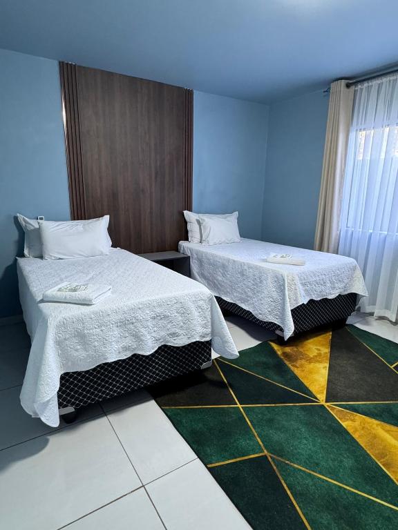 Postel nebo postele na pokoji v ubytování Eden Villas Guesthouse