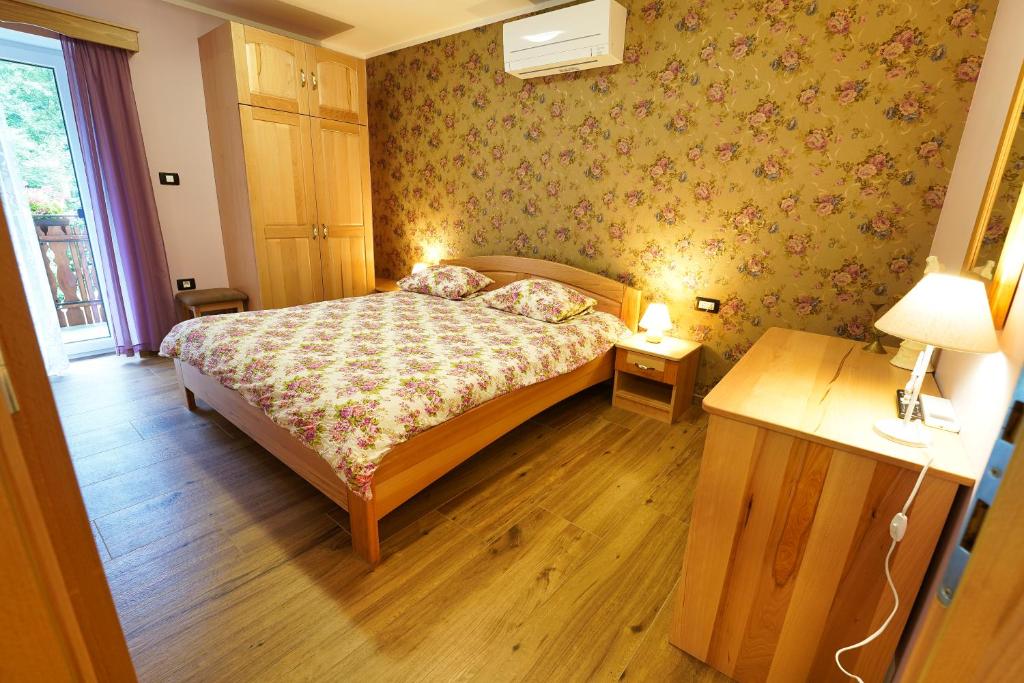 Postel nebo postele na pokoji v ubytování Domačija Bubec