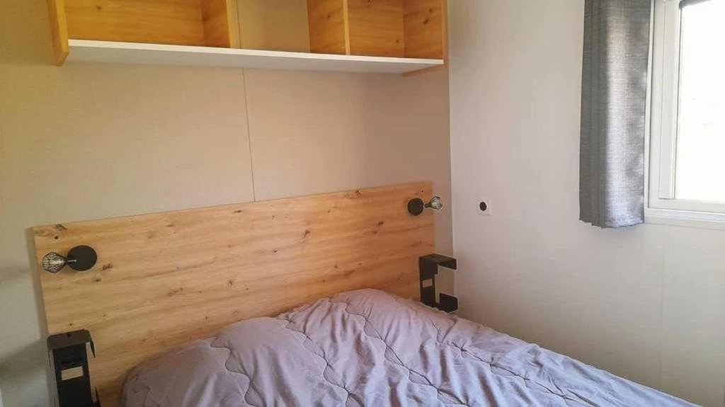 Postel nebo postele na pokoji v ubytování Camping 3 étoiles - ccbaf0c