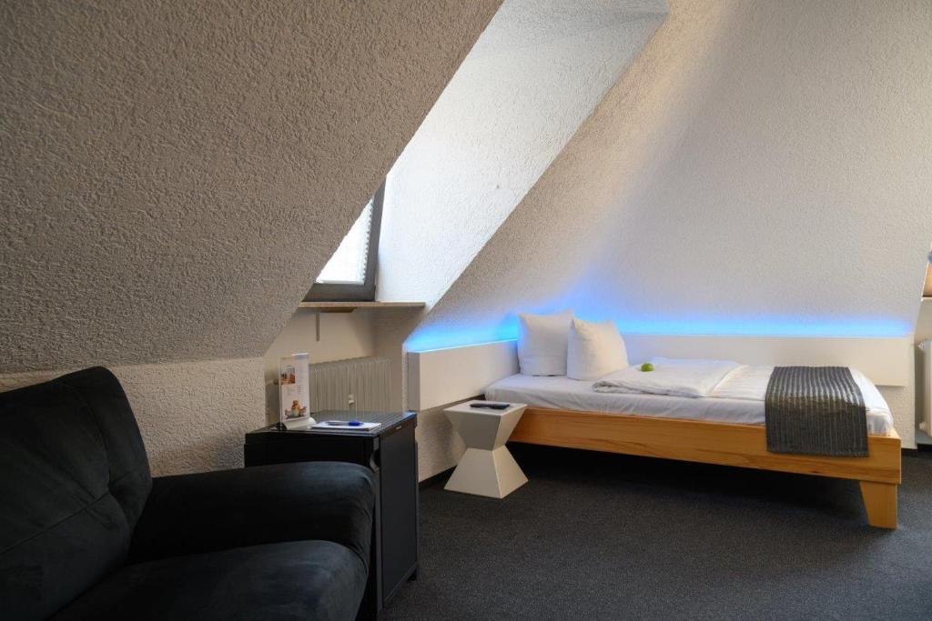 Postel nebo postele na pokoji v ubytování Hotel Heymann