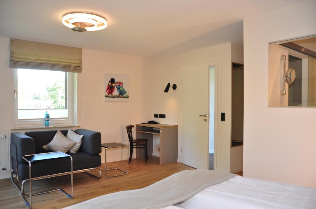 Postel nebo postele na pokoji v ubytování Hotel Sauerländer Hof
