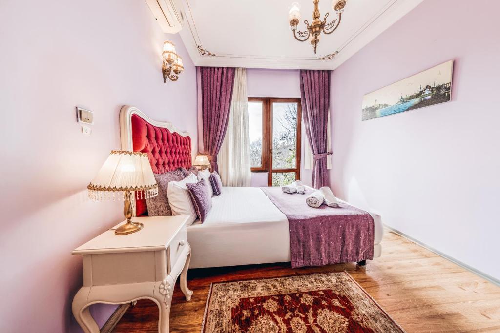 Postel nebo postele na pokoji v ubytování Olive Garden Apart