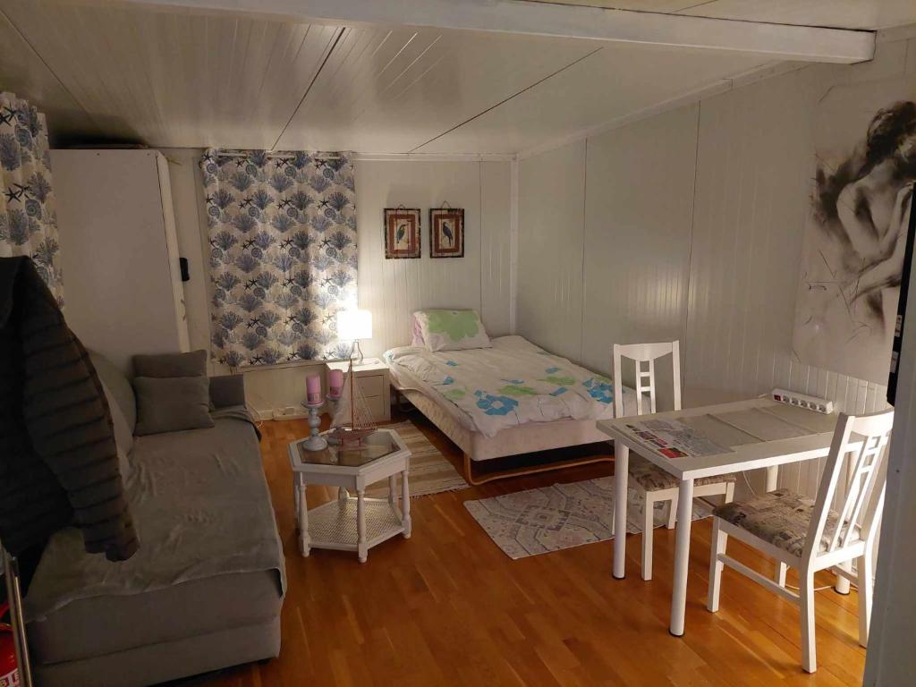 Postel nebo postele na pokoji v ubytování Ålesund New Guesthouse